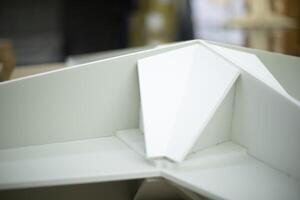 Item in the workshop. Creation of scenery. White star on the table. photo