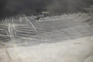 Adhesive tape on car. Sealed area on material. Sealed broken glass. photo