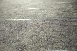 Parking spaces on asphalt. Empty spaces for transport. White markings on asphalt. photo