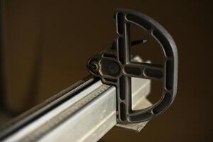 Rail guide on the machine. Ruler on the machine. Technical equipment for sawing materials. photo