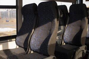 Seat on bus. Space for passengers. photo
