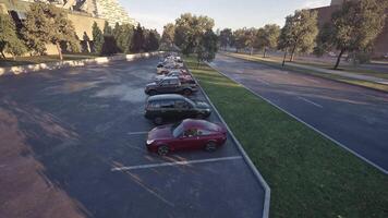 Early morning view of nearly empty parking lot with trees lining the area video