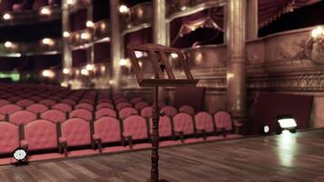 Old opera house stage with a music stand set for a captivating performance video