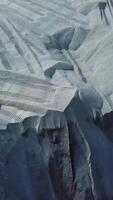 Aerial view of industrial background with mineral mining quarry. Stock footage. Opencast sand mining quarry with lots of machinery tracks, view from above. video