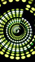 Abstract spinning circles of small spotlights rotating on a black background. Media. Colorful blinking lamps. Vertical . video