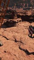 A large crane sitting in the middle of a desert video