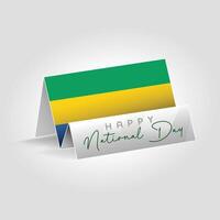 Gabon country paper flag standing on the ground. Happy national day flag design. vector
