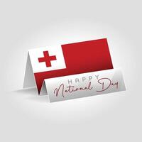 Tonga country paper flag standing on the ground. Happy national day flag design. vector