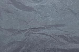 A crumpled paper texture background with a gray background photo