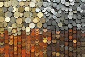 A wall of coins with different colors photo