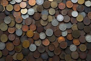 A large pile of coins is shown in this photo