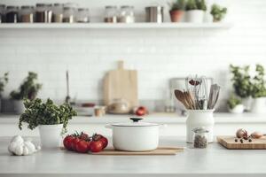Kitchen with pots, pans and utensils on counter photo