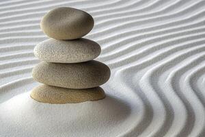 A stack of rocks in a sand dune photo