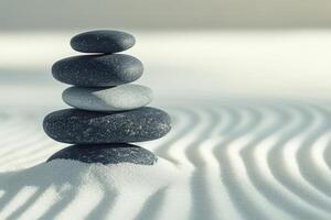 A stack of rocks in the sand photo