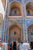 Samarkand, Uzbekistan-august 12, 2023-Particular of the Registan square occupied by a large complex made up of 3 madrasas photo