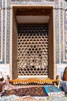 Samarkand, Uzbekistan-august 12, 2023-Particular of the Registan square occupied by a large complex made up of 3 madrasas large complex made up of 3 madrasas photo