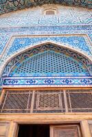 Samarkand, Uzbekistan-august 12, 2023-Particular of the Registan square occupied by a large complex made up of 3 madrasas photo