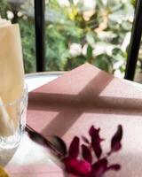 Luxury restaurant menu book with sun shadow photo