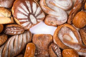 Tasty breads top view with empty center for logo photo