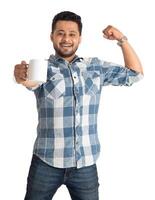 Handsome smiling man with cup of coffee or tea isolated on white background photo