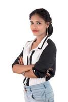 Portrait of beautiful young smiling girl posing on white background photo
