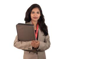 Young happy business woman holding folder photo