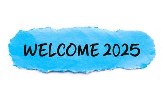 Welcome 2025 on white background and torn blue paper. New year concept with typographic welcome 2025 on paper photo