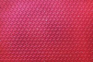 Bright abstract background of ight green color. The texture of the surface of the grill pan. photo