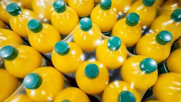 Multipack of orange juice bottles representing convenience and bulk buying for home stock and healthy living concepts photo