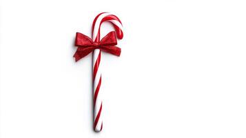 Minimalist line art of a Christmas candy cane with a small bow wrapped around it isolated on white background photo