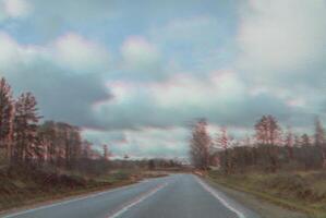View through the moving car windscreen. photo