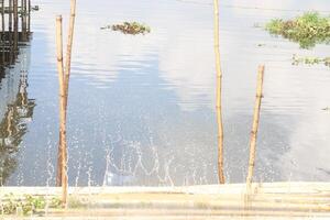 Water Splash on pond from hit photo