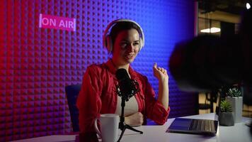 Female blogger recording content for her blog and calls to put likes and subscribe to the channel video