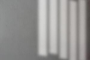 Black shadows on concrete wall. Shadow overlay effect. Scene of natural lighting. Blank background for design. Background for ideas. photo