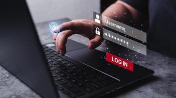 Woman use fingerprint scanner for cyber security log in online on laptop. Data protection from hacker. photo