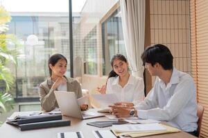 Business Team Collaborating on Work Plans During a Meeting in a Modern Office Setting photo