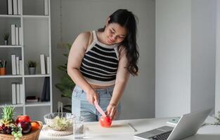 Young Woman Enjoying a Healthy Salad for Wellness and Nutrition in a Modern Home Setting photo