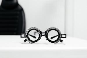 Close-up of glasses for vision testing and lens fitting. An excellent image to illustrate the importance of eye health and diagnostics. photo
