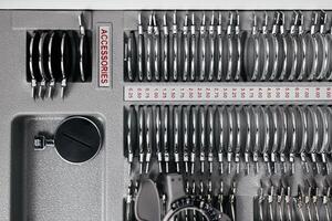 A vision measuring instrument with a trial frame used by optometrists for vision testing and eyewear selection. Concept of vision improvement, correction and restoration. Ophthalmologist instrument photo
