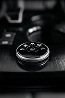 Stylish driving mode control panel in car with intuitive icons for various driving conditions. Elegant design, high quality, and ease of use emphasize the premium feel of interior. Leasing, purchase photo