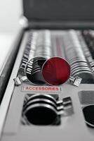 A vision measuring instrument with a trial frame used by optometrists for vision testing and eyewear selection. Concept of vision improvement, correction and restoration. Ophthalmologist instrument photo