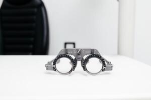 Close-up of glasses for vision testing and lens fitting. An excellent image to illustrate the importance of eye health and diagnostics. photo