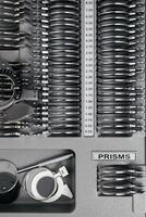 A vision measuring instrument with a trial frame used by optometrists for vision testing and eyewear selection. Concept of vision improvement, correction and restoration. Ophthalmologist instrument photo