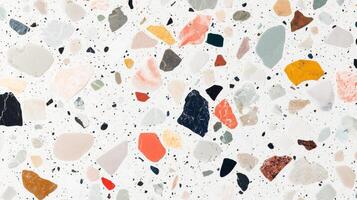 A colorful mosaic made of small rocks and pebbles. The colors are bright and vibrant, creating a lively and energetic atmosphere. photo