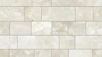 A wall made of white tiles with a pattern of squares. The wall is very clean and has a very simple design photo