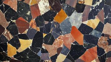 A mosaic made of colorful rocks and stones. The colors are bright and the stones are of various sizes. photo