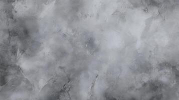 A grey wall with a few spots of white. The wall is covered in a greyish-blue paint photo