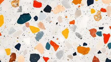 A colorful mosaic made of small rocks and pebbles. The colors are bright and vibrant, creating a lively and energetic atmosphere. photo