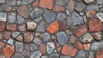 A brick wall with a variety of different colored bricks. The wall is made up of many different sized bricks, and the colors vary from red to gray. photo