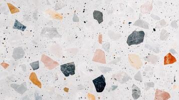 A colorful mosaic made of small rocks and pebbles. The colors are bright and vibrant, creating a lively and energetic atmosphere. photo